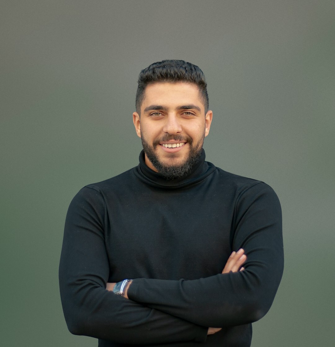 Smiling middle-aged Turkish man testimonial